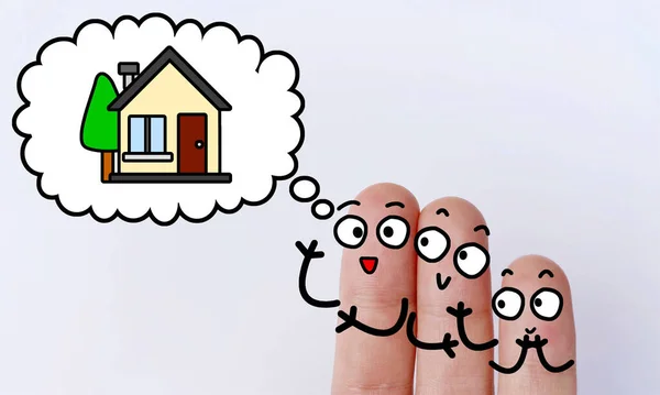 Three fingers are decorated as three person thinking about buying a new house.