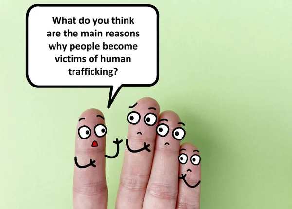 Four fingers are decorated as four person. One of them is asking about main reasons why people become victims of human trafficking