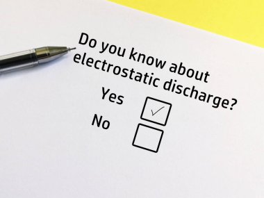 One person is answering question about electronics. He knows about electrostatic discharge.