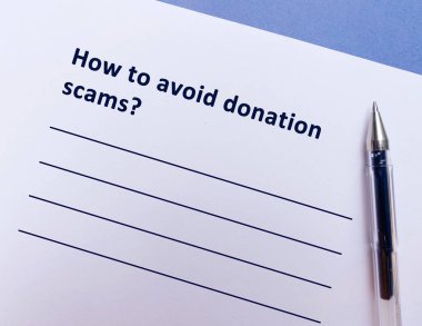 One person is answering question about scams. He is thinking how to avoid donation scams.