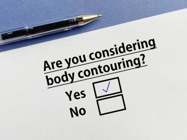 A person is answering question about cosmetic surgery. She is considering body contouring.