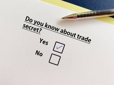 One pereson is answering question about business. He knows about trade secret.