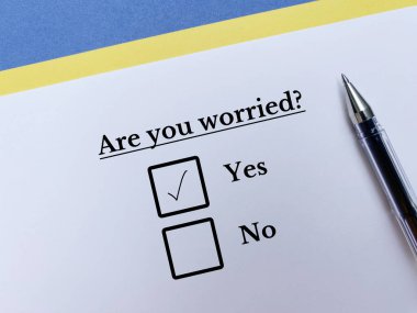 One person is answering question. He thinks he is worried.