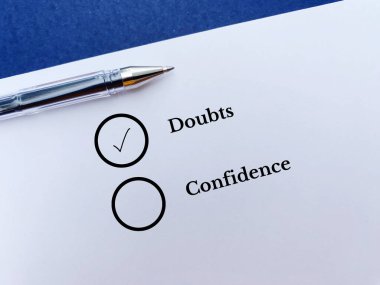 One person is answering question. He is choosing doubts over confidence.
