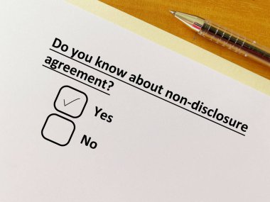 One person is answering question about agreement. He knows about non-disclosure agreement.