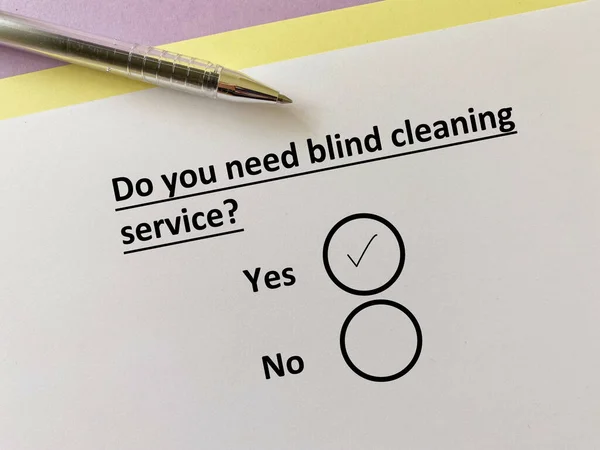 stock image One person is answering question about cleaning service. He needs blind cleaning service.