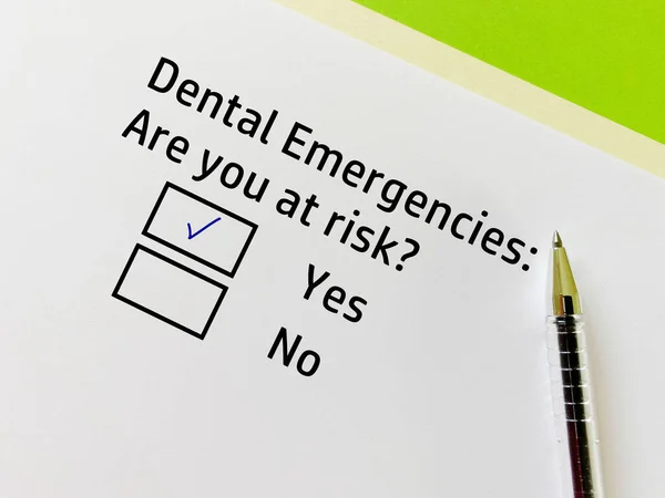 One person is answering question about dental care. She is at risk for dental emergencies.