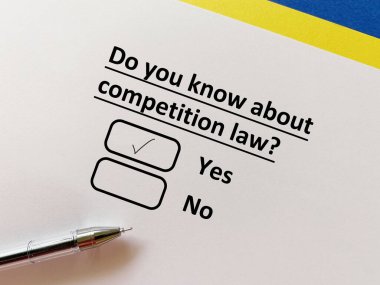 A person is answering question about law. He knows about competition law.