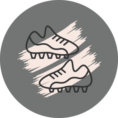 Gri arkaplanda futbol kramponları