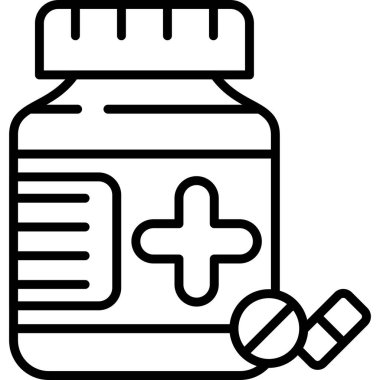 Yanında haplar olan bir şişe ilaç.