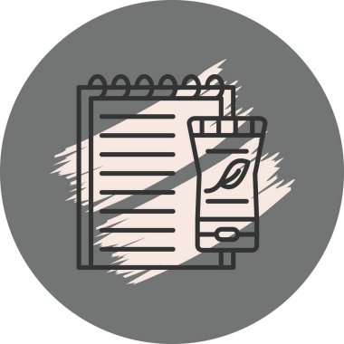 Arka planda not defteri ve krem tüpü