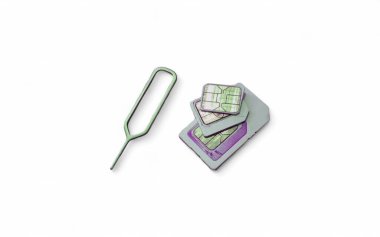 Three mobile SIM cards and a SIM ejector on isolated background. clipart