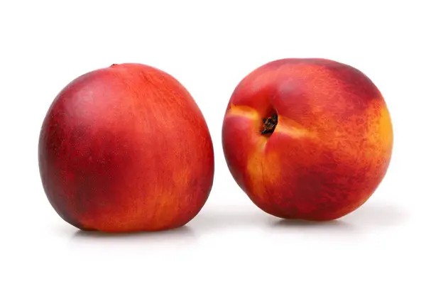 Şeftali nektarin izole üzerinde beyaz arka plan.