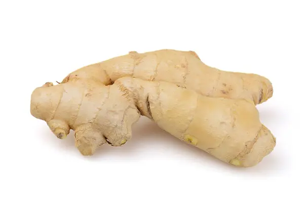 Beyaz arkaplanda zencefil kökü izole edildi