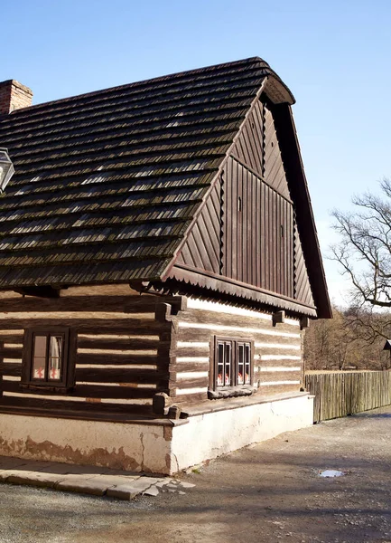 stock image STARE BELIDLO, CZECH REPUBLIC - FEBRUARY 13, 2022: Rural cottage built of logs in Babiccino udoli or Grandmother's Valley in Bohemia