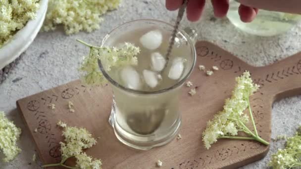 Stirring Homemade Drink Made Elder Flower Syrup Glass — Stockvideo