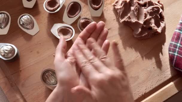 Pressing Cocoa Dough Tin Molds Prapare Nut Shaped Christmas Cookies — Vídeos de Stock