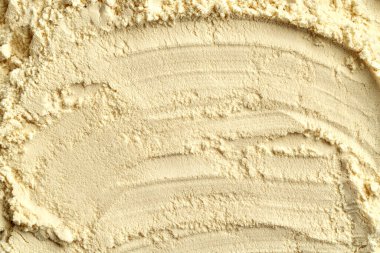 Whey protein powder - textured background with copy space