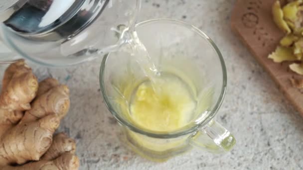 Pouring Hot Water Glass Cup Prepare Ginger Tea — Vídeos de Stock