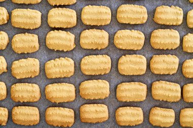 Christmas cookies on a baking sheet, top view