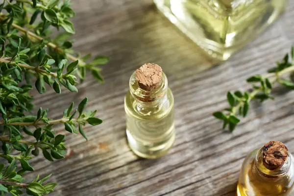 Bottle Aromatherapy Essential Oil Fresh Thyme Twigs — Stock Photo, Image