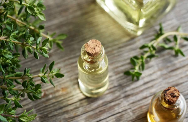 Bottle Aromatherapy Essential Oil Fresh Thyme Twigs — Stock Photo, Image