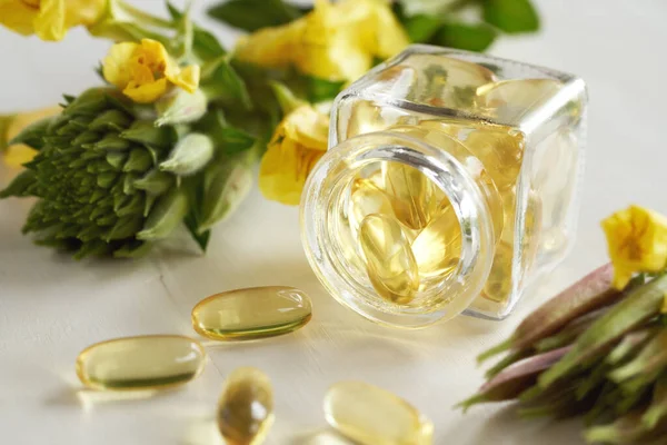 Evening Primrose Oil Capsules Spilled Glass Bottle Blooming Oenothera Biennis — Stock Photo, Image