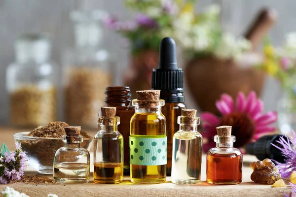 Bottles Aromatherapy Essential Oil Frankincense Myrrh Echinacea Blooming Oregano Other — Stock Photo, Image