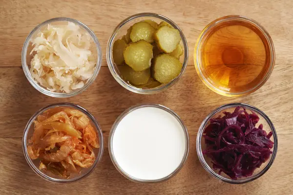 Fermented foods - kim chi, white and purple sauerkraut, apple cider vinegar, kefir and gherkins