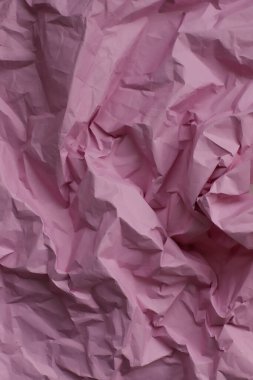 Arkaplan için buruşuk mor ya da sıcak pembe kağıt
