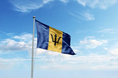 Mavi gökyüzünde Barbados bayrağı sallıyor. Cumhuriyet Günü ve Bağımsızlık Günü için Barbados bayrağı.