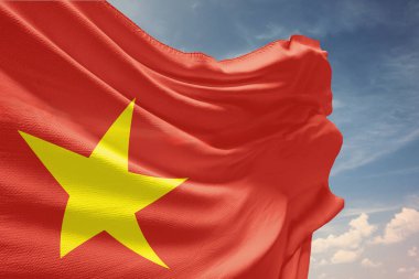 Waving flag of Vietnam in blue sky. Vietnam flag on pole for Independence Day. The symbol of the state on wavy fabric. clipart