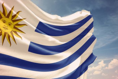 Uruguay ulusal bayrağı güzel mavi gökyüzünde dalgalanıyor. 3d oluşturma