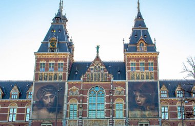 Historical beautiful Dutch architecture at the Rijksmuseum in Amsterdam. Photo taken during the daytime in Amsterdam Holland clipart