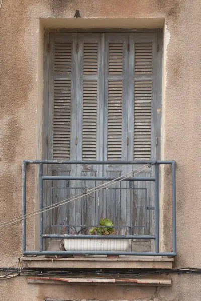 Door and balcony detail in old Bonifacio