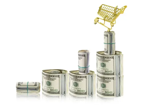 Finans - yüksek büyüme ya da satışlarda düşüş. Para birimi Amerikan doları. Tablonun tepesinde altın bir alışveriş sepeti bulunan yüzlerce dolarlık rulo çizelgesi. Tüketim dünyasında bankacılık ve endüstri. Doların değeri