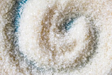 Bir kasede granüle şeker dokusu