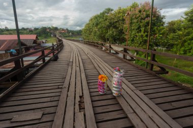 WoodenMon Bridge isThailand's longestwooden bridgewith the length of 850 meters.  It was builded for comfortable transportation between people living in Sangkhlaburi andMonVillages. clipart