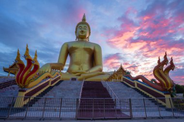 Wat Muang is an old temple in Ang Thong Province. The large Buddha statue was built in 2008. It is the largest in Thailand and is a landmark where you must come to worship and ask for blessings when visiting here clipart