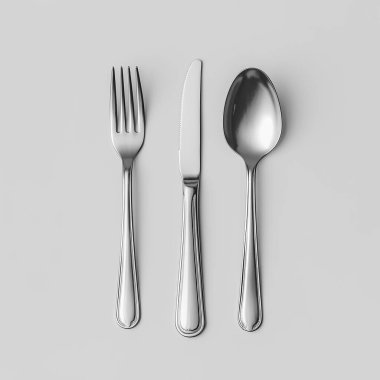 silver fork, spoon and knife on a white background.