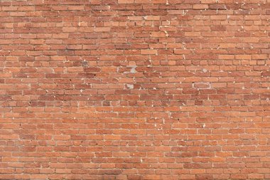 Arkaplan grafikli tuğla duvar, noktalama noktalarında boşluklar var, ağır desenli tuğla, yatay görünüm