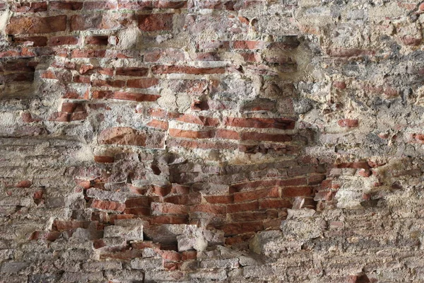 Old London red brick wall texture background. Old wall for rusting at the construction area. Isometric wall after earthquake natural disaster.