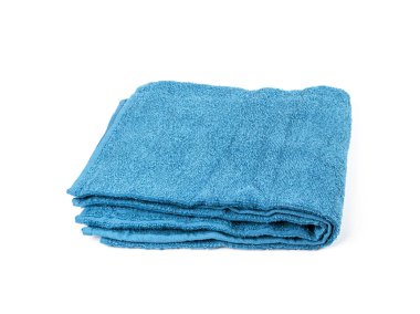 Folded Blue Towel Isolated. New Terry Cotton Towel, Soft Washcloth on White Background