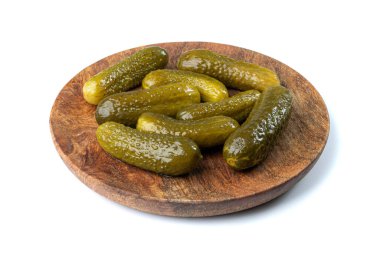 Pickled Cucumbers on Wood Plate Isolated. Fermented Food, Marinated Canned Vegetables, Gherkins, Pickled Cucumbers on White Background