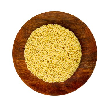 Dry Instant Noodles Isolated, Round Asian Pasta on Wooden Plate, Traditional Korean Ramen, Uncooked Instant Egg Noodles