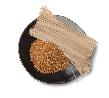 Dry Soba Isolated, Raw Buckwheat Noodles, Uncooked Buck Wheat Pasta, Gluten-Free Soba Spaghetti on White Background Top View