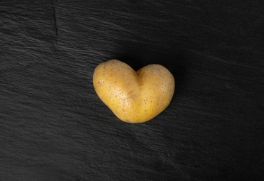 Potato Heart Top View with Copy Space, Heart Shape Potato, Love Vegetable, Valentine Day Symbol