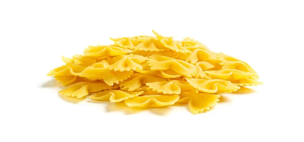 生Farfalle Pasta分离 黄色干蝴蝶面团 小麦Bow Macaroni 白色背景的未煮熟Farfalle Pile — 图库照片