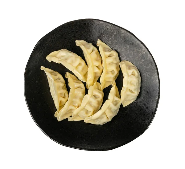 Gyoza Kinesiska Dumplings Svart Tallrik Isolerade Vegetabiliska Jiaozi Kyckling Momo — Stockfoto