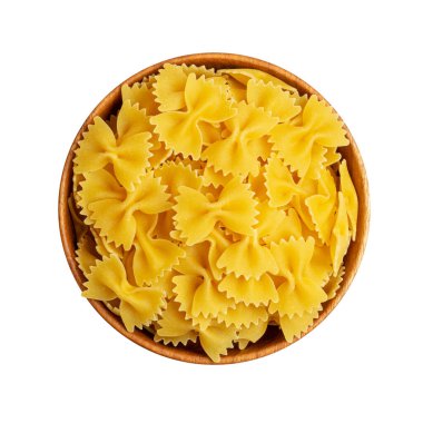 Raw Farfalle Pasta Isolated, Yellow Dry Butterfly Noodles, Wheat Bow Macaroni, Uncooked Farfalle in Wooden Bowl on White Background Top View